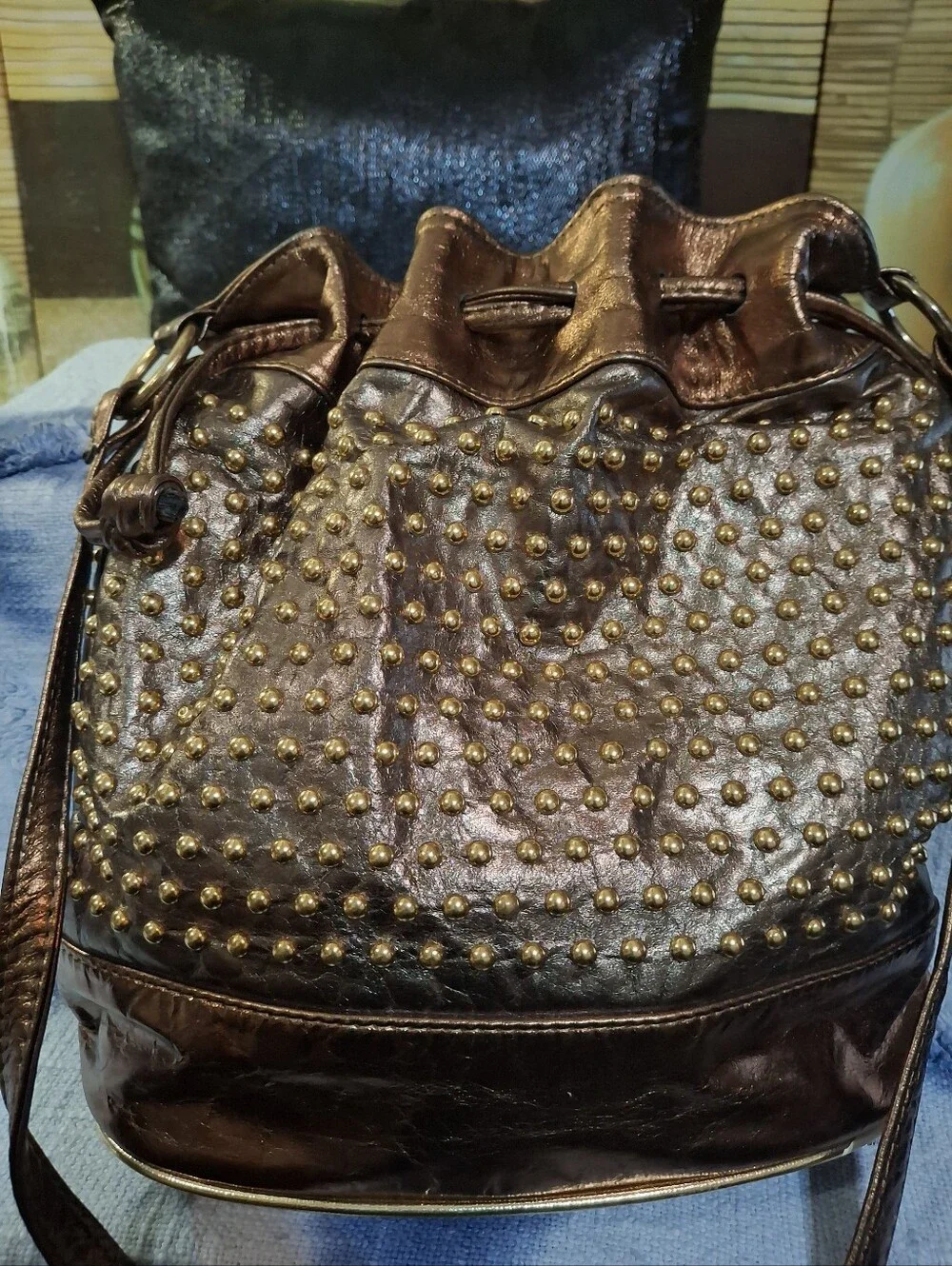Metallic Brown Studded Drawstring Shoulder Bag